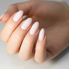 Beautiful nail extensions with light pink polish